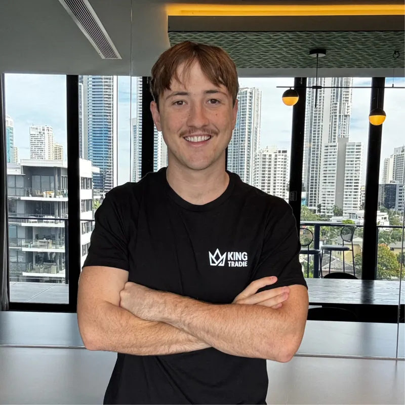 Lachlan, founder of KINGTRADIE, wearing a KINGTRADIE shirt